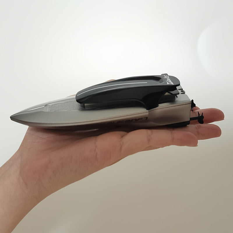 Mini barcă de jucărie acvatică – Controlată de la distanță cu iluminare LED
